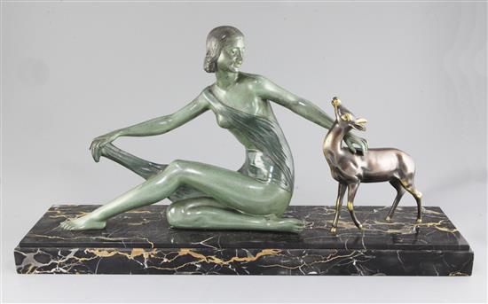 P. Hugonnet. An Art Deco bronze group of a maiden and a fawn, width 25in. height 13.5in.
